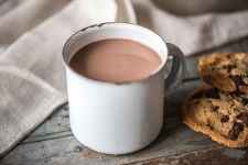 coffee cup beside biscuits